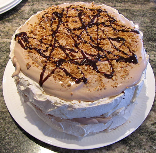 double layer chocolate pavlova with hazelnuts layered pavlova with chocolate cream
