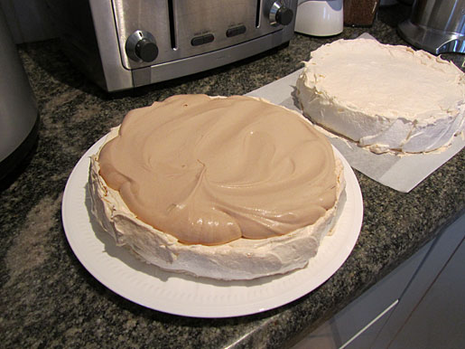 pavlova with chocolate cream layered pavlova with chocolate cream center