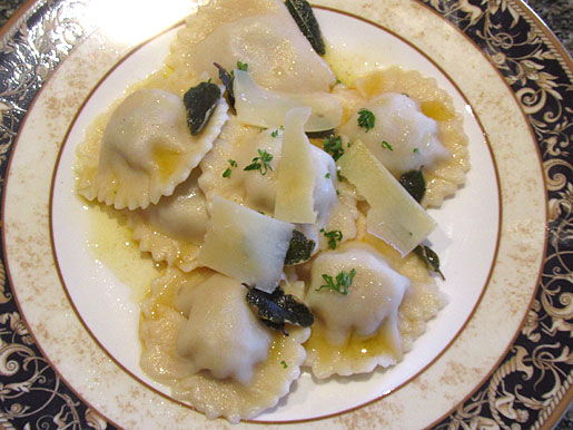ravioli with pumpkin and pine nuts in burnt sage butter sauce pumpkin ravioli with pine nuts with burnt sage butter